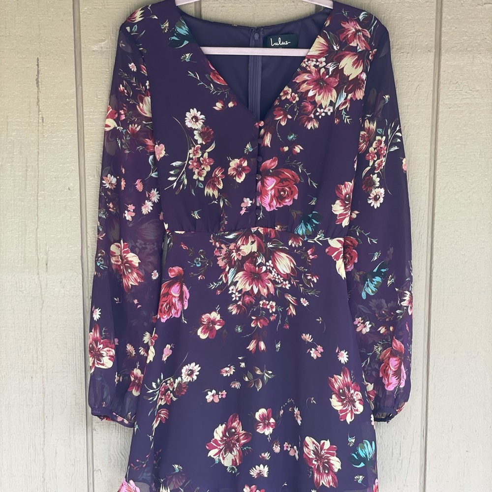 Long sleeve mid thigh dress.